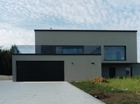 Garagentor mit Stil: Komfort und Sicherheit punkten Garagentor mit Stil: Komfort und Sicherheit punkten