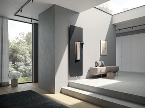 Ein flächiger Heizkörper bringt zeitlose Eleganz in den Raum. Foto: Kermi GmbH/akz-o