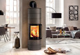Bildunterschrift: Effizientes und ressourcenschonendes Heizen mit Holz. Foto: Spartherm/akz-o